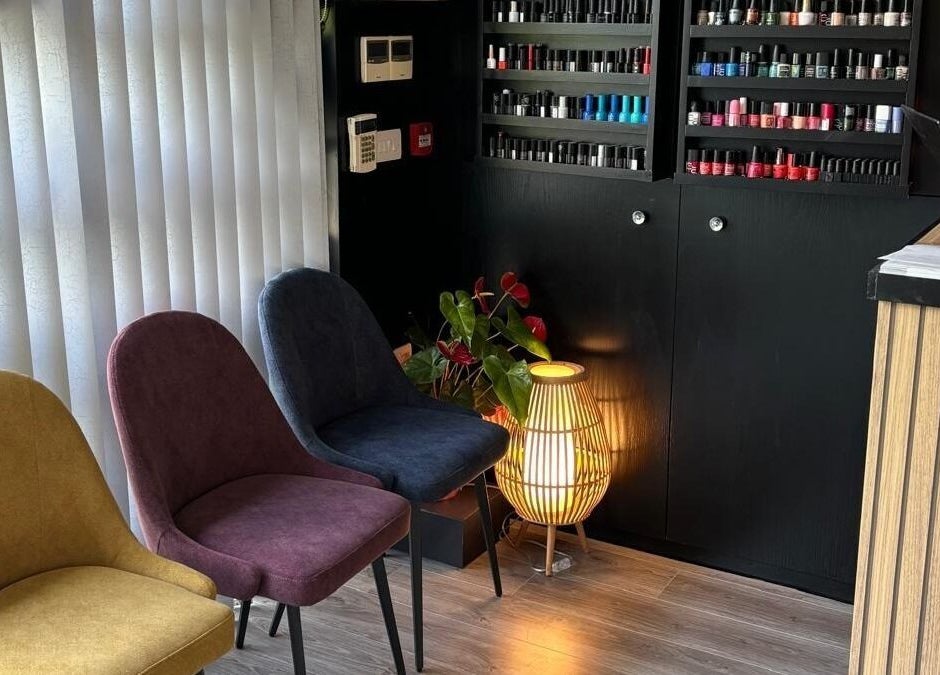 Inviting seating area at Lisashealth&beauty in Clarinbridge, County Galway, IE, featuring colorful chairs and modern decor.