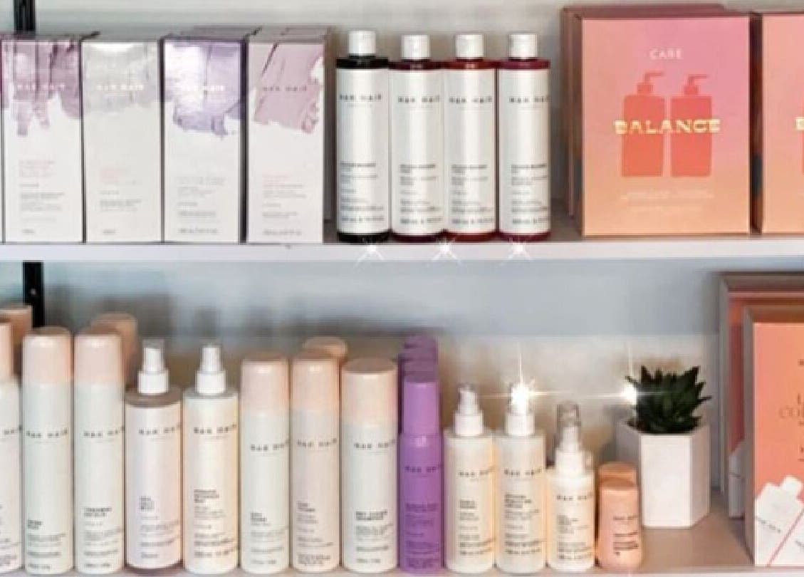 Stylish display of hair care products at Envious Hair And Beauty, Figtree, New South Wales, AU.