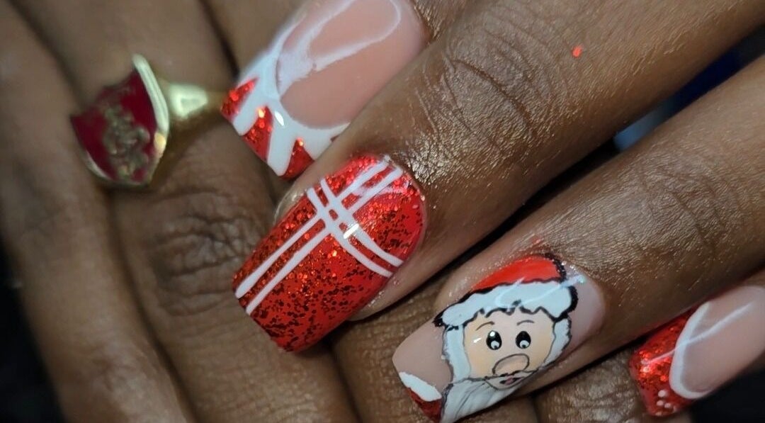 Festive nail art with Santa design at The Wild Dragonfly Spa, Tunapuna/Piarco Regional Corporation, TT.