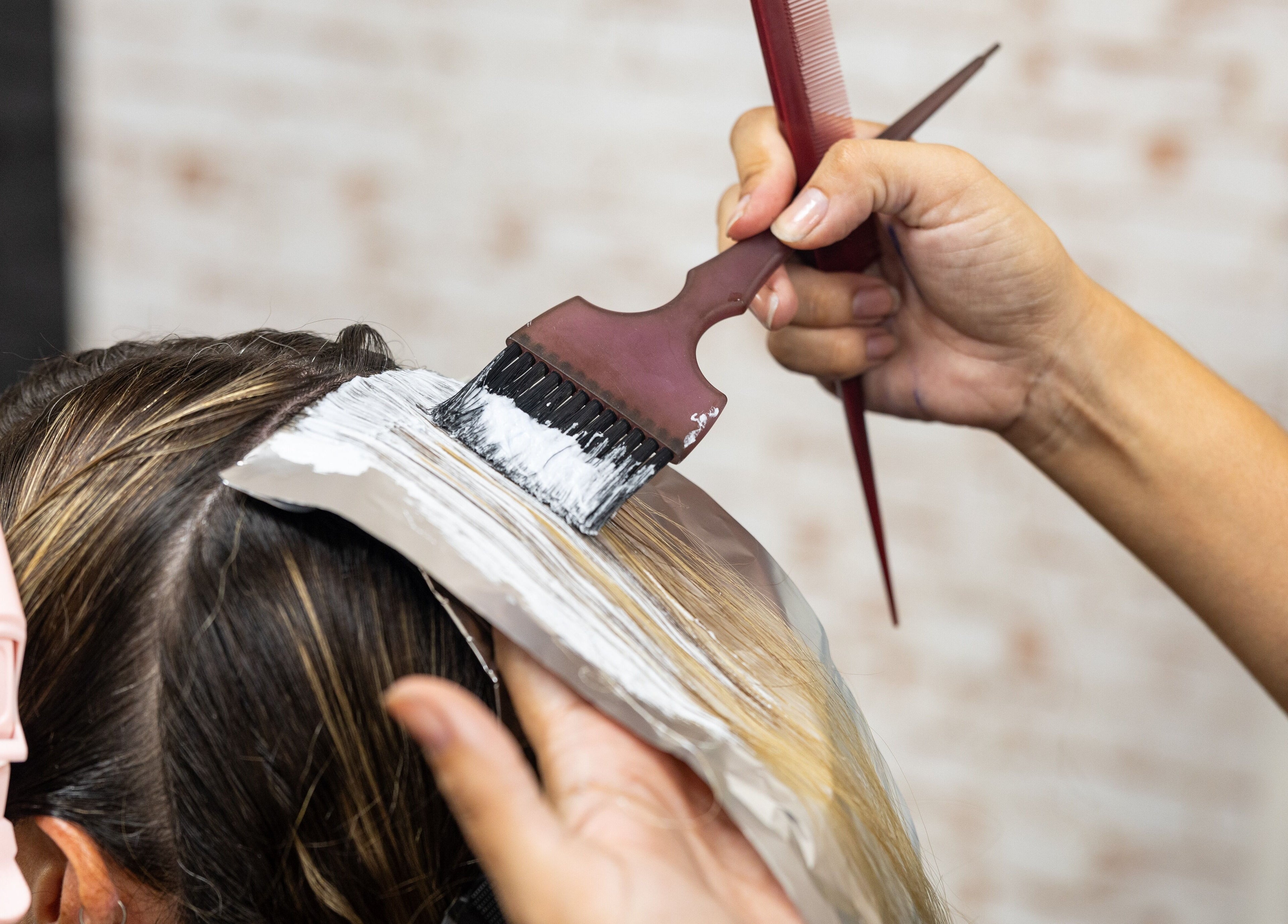 Hair coloring in progress at Claudia and Co, Toowong, Queensland, AU. Professional hair treatment service.