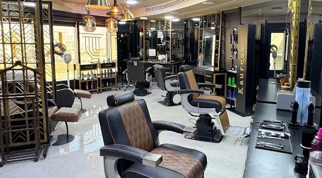 Interior of Kaureas beauty salon in Amman, Amman Governorate, JO, featuring elegant styling chairs and decor.