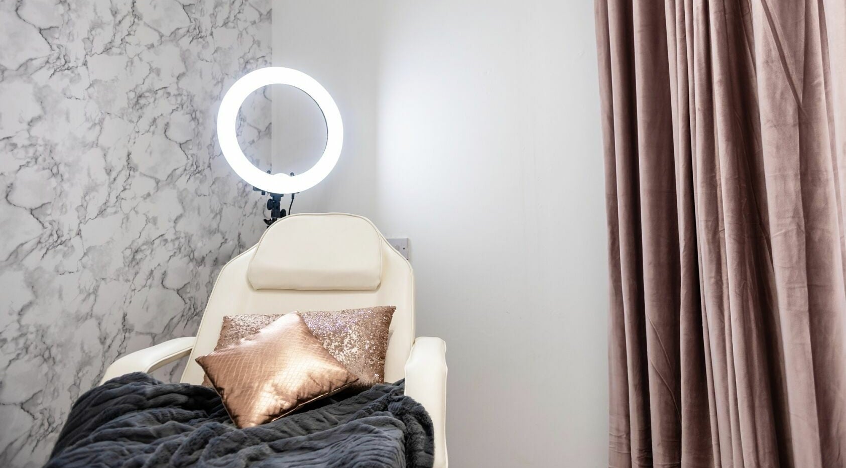 Luxurious spa chair at That Rosie Glow - Edinburgh, Scotland, GB, with elegant decor.