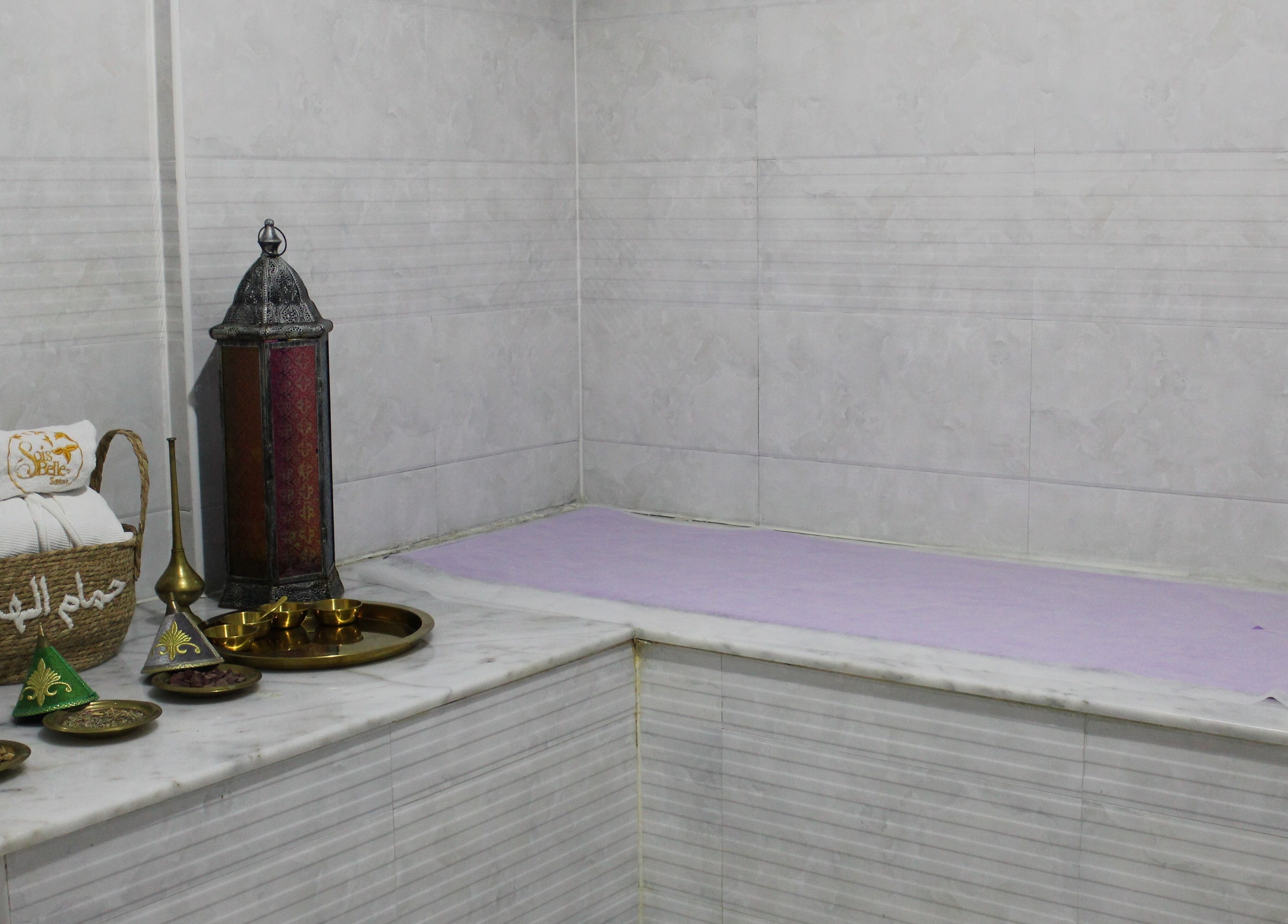 Relaxing spa setup at Sois Belle Salon with elegant decor in Abu Dhabi, AE for ultimate wellness experience.