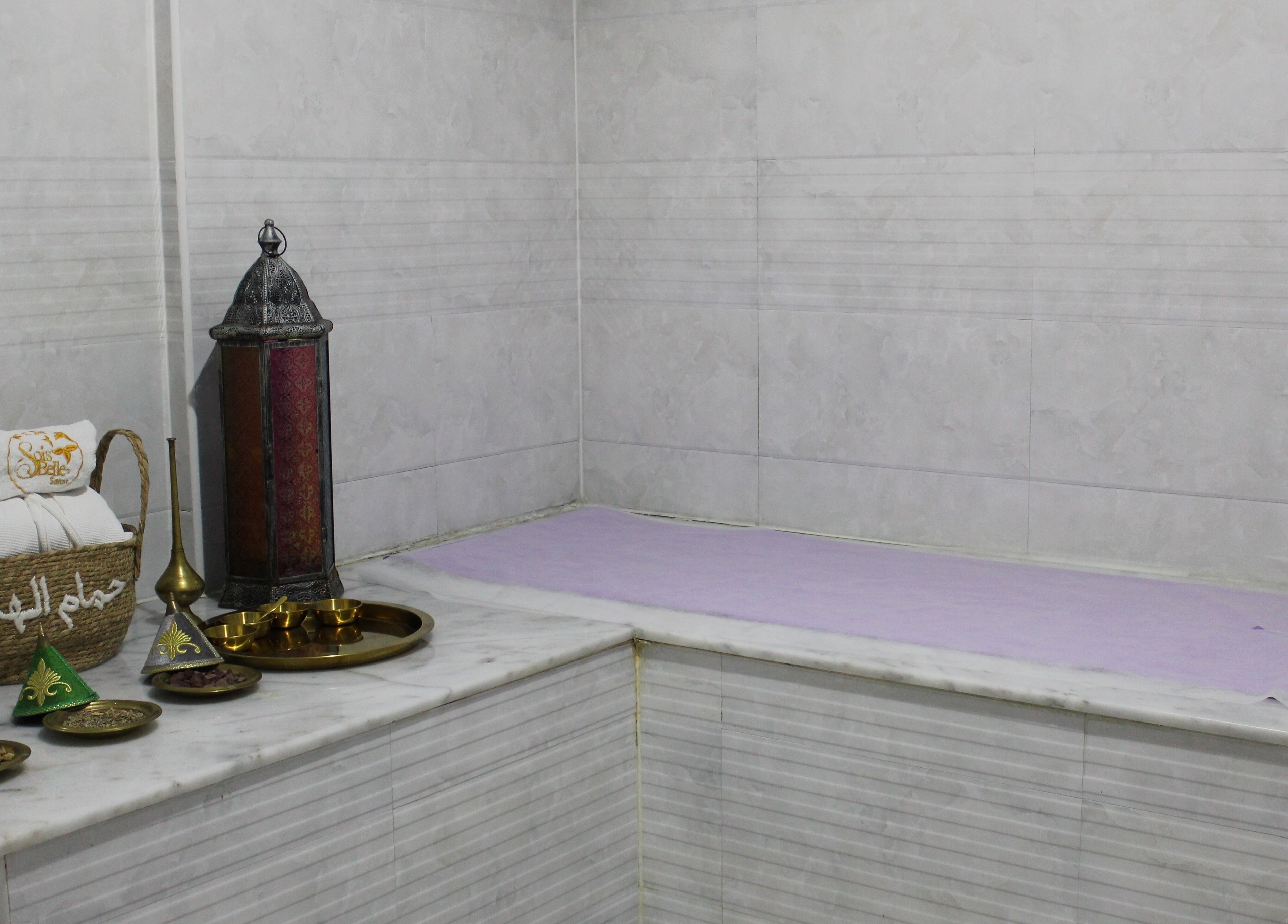 Relaxing spa setup at Sois Belle Salon with elegant decor in Abu Dhabi, AE for ultimate wellness experience.