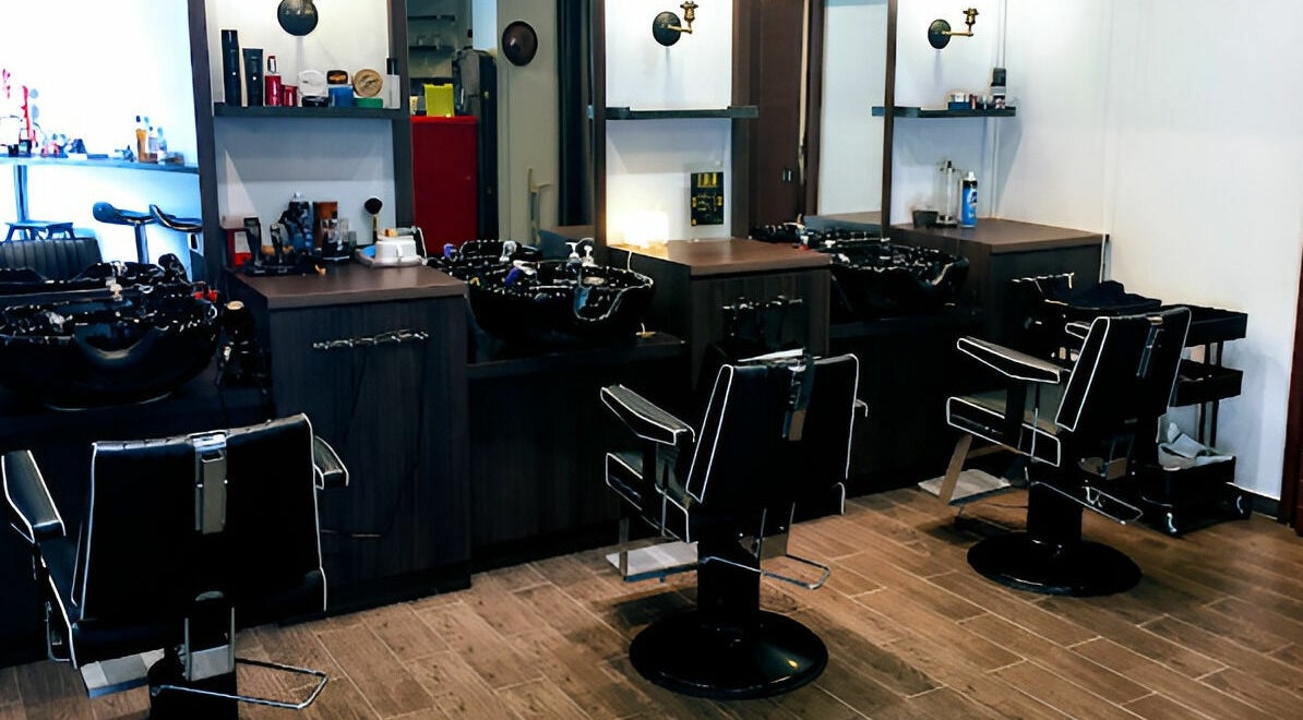 Modern salon interior at John's Style in Singapore, Singapore, SG featuring sleek styling stations and chairs.