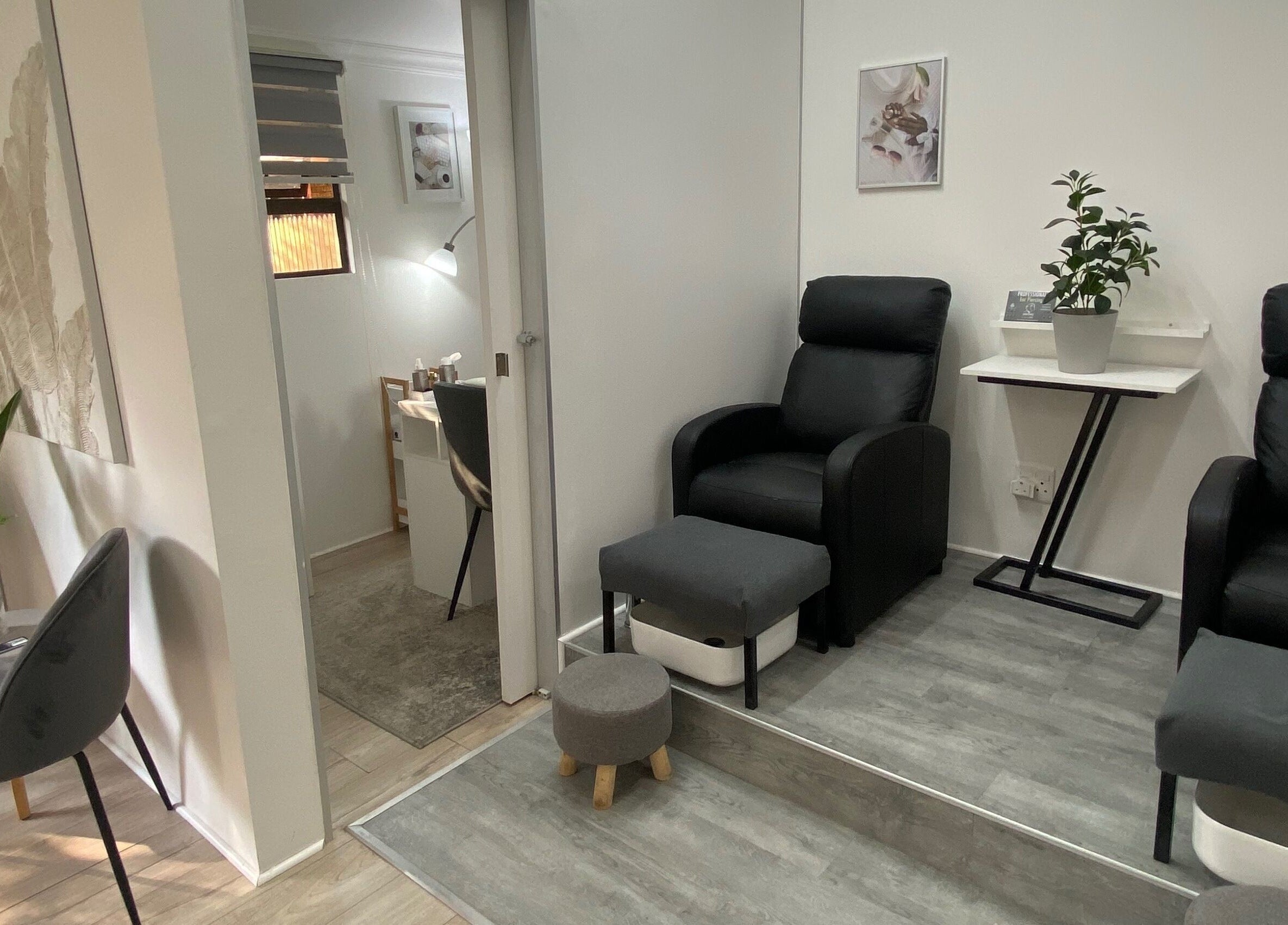 Cozy spa room with plush chairs at Nails and Things, Johannesburg, Gauteng, ZA.