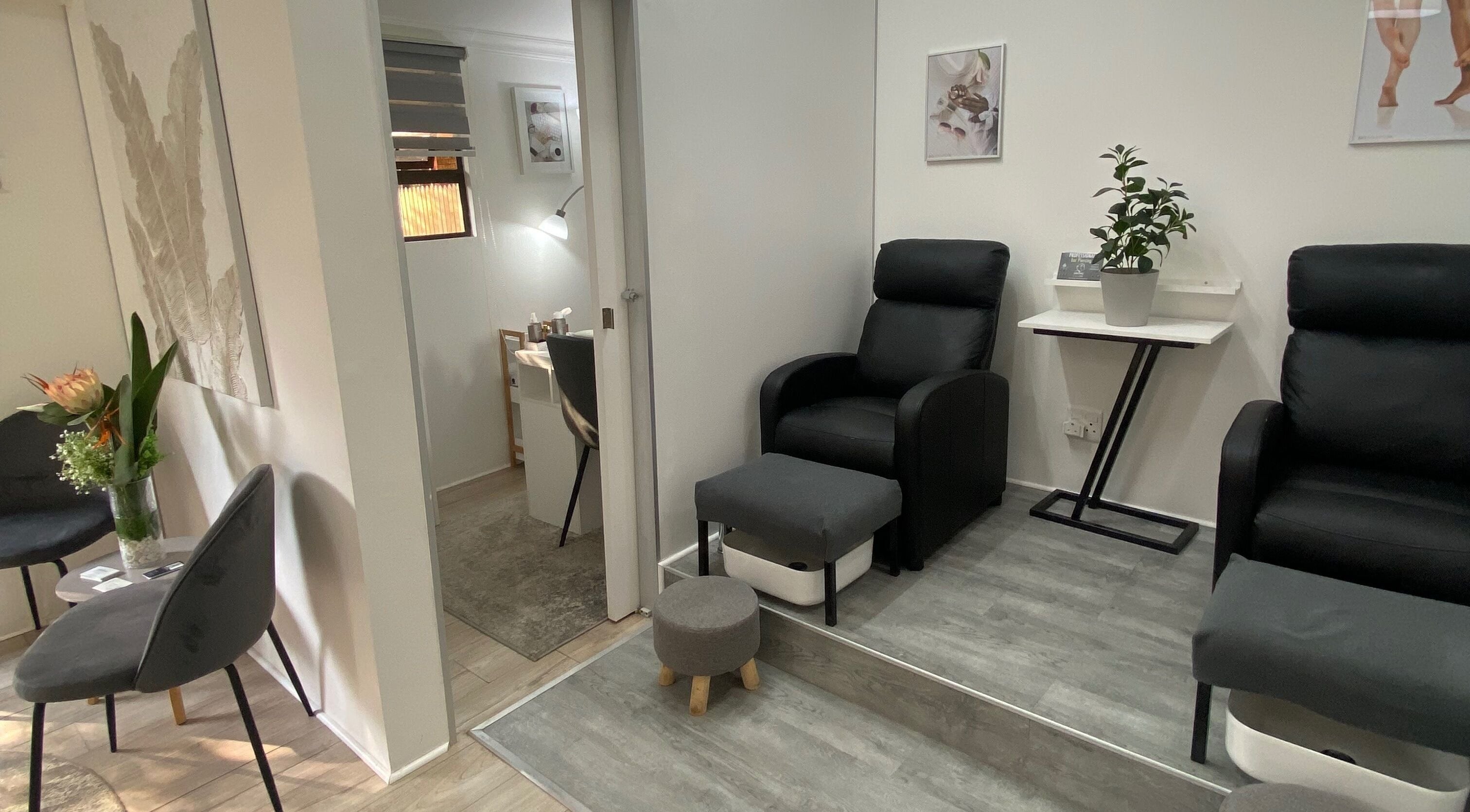 Cozy spa room with plush chairs at Nails and Things, Johannesburg, Gauteng, ZA.