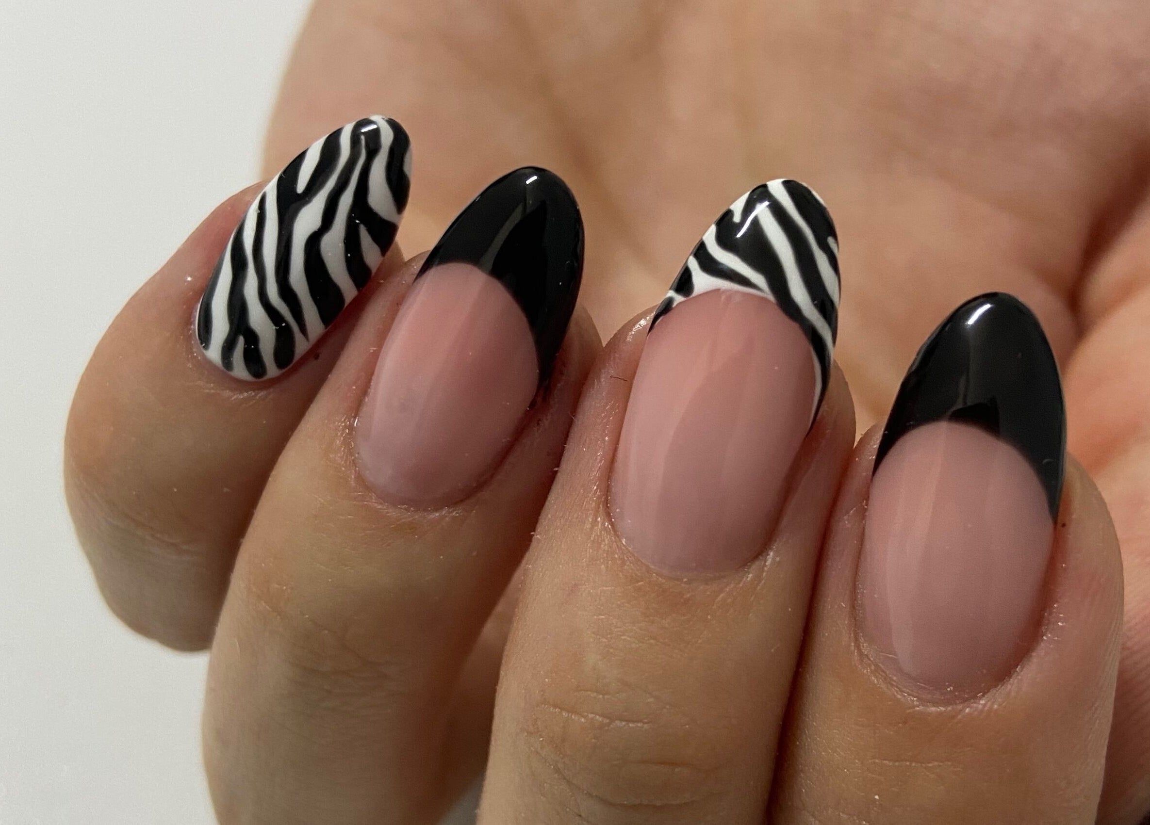 Stylish zebra print nail art at Nails and Things, Johannesburg, Gauteng, ZA.