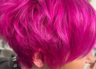 Bright magenta hairstyle at Angela Lewis - Architects of Hair in Gatley, England, GB.