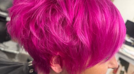 Bright magenta hairstyle at Angela Lewis - Architects of Hair in Gatley, England, GB.