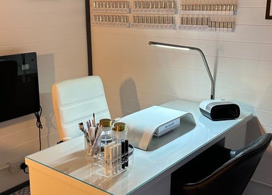 Chic nail station at Omg Beauty, Alva, Scotland, GB, featuring modern aesthetics and nail care tools.