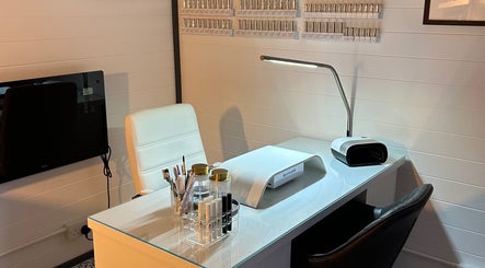 Chic nail station at Omg Beauty, Alva, Scotland, GB, featuring modern aesthetics and nail care tools.