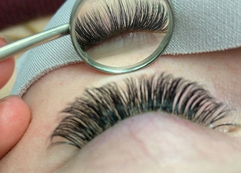 Close-up of expertly applied eyelash extensions at Cut of Class, Carman, Manitoba, CA.