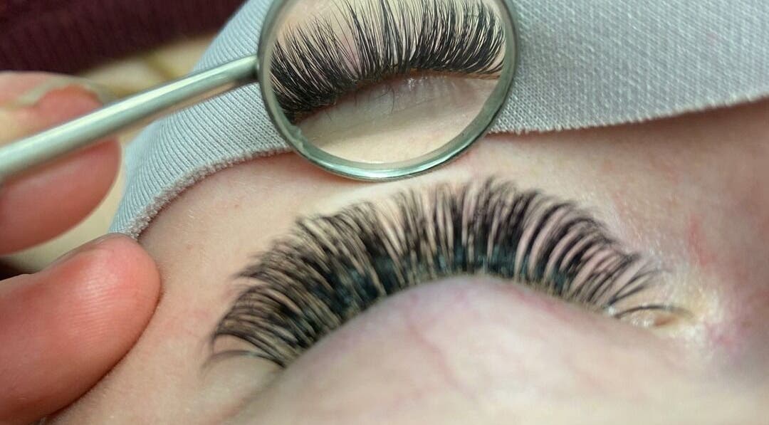 Close-up of expertly applied eyelash extensions at Cut of Class, Carman, Manitoba, CA.