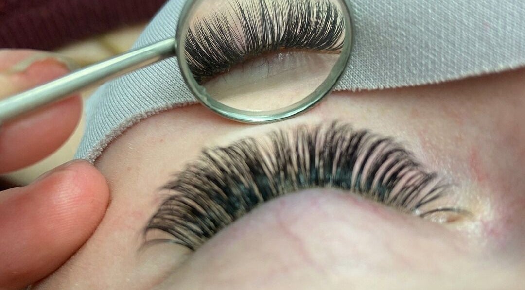 Close-up of expertly applied eyelash extensions at Cut of Class, Carman, Manitoba, CA.