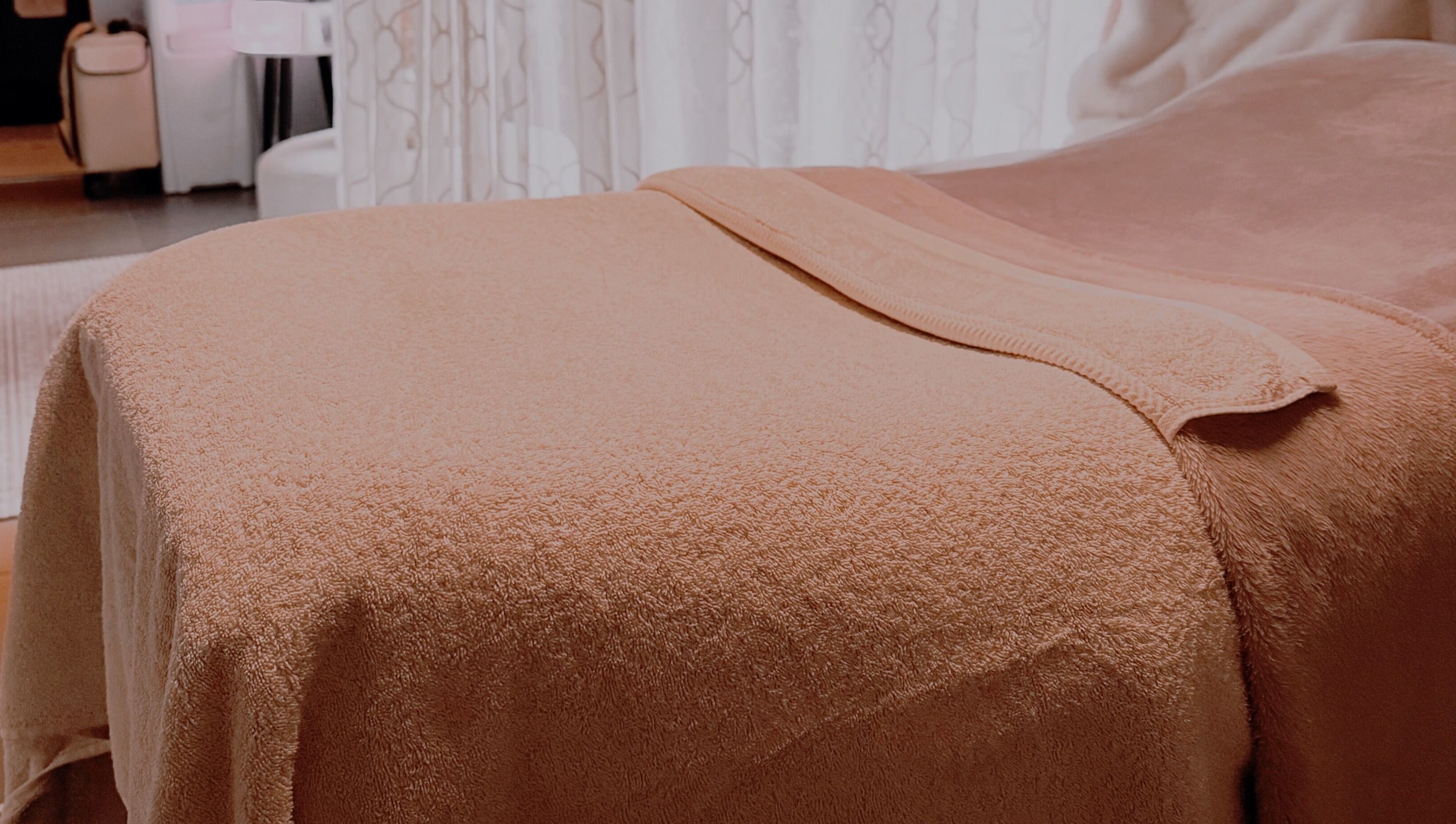 Cozy massage bed at Serene Skin & Body in Mount Hutton, New South Wales, AU, showing a relaxing setting.