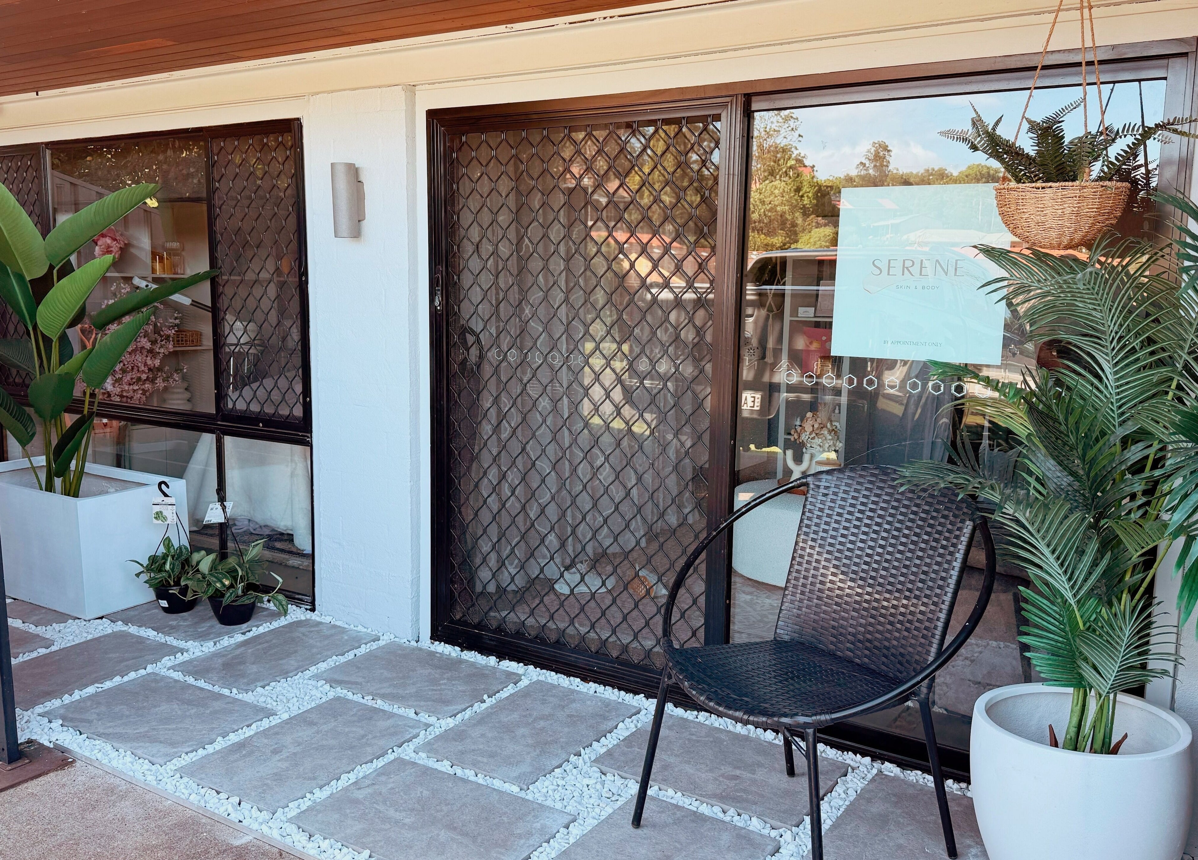 Serene Skin & Body entrance with lush plants in Mount Hutton, New South Wales, AU.