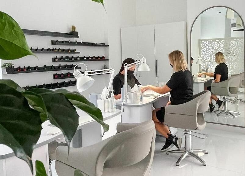 Professional nail care at Phenomenal Ladies Salon, Abu Dhabi, AE with modern decor and lush greenery.
