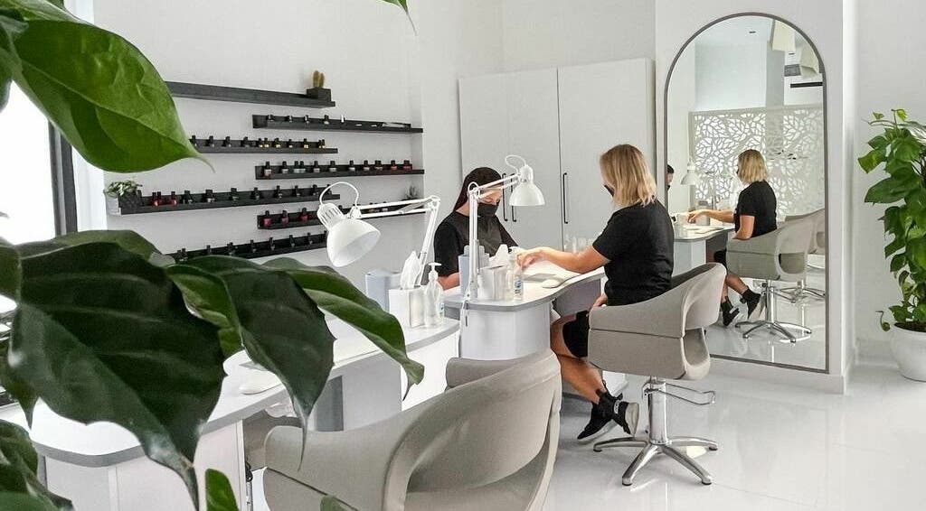 Professional nail care at Phenomenal Ladies Salon, Abu Dhabi, AE with modern decor and lush greenery.