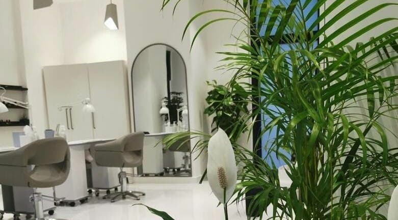 Peaceful salon space at Phenomenal Ladies Salon in Abu Dhabi, AE featuring lush greenery and elegant decor.