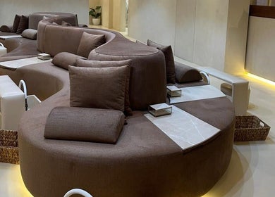 Luxurious seating area at Naeeman Salon صالون نعيماً, Jabriya, Hawalli Governorate, KW offers relaxation.