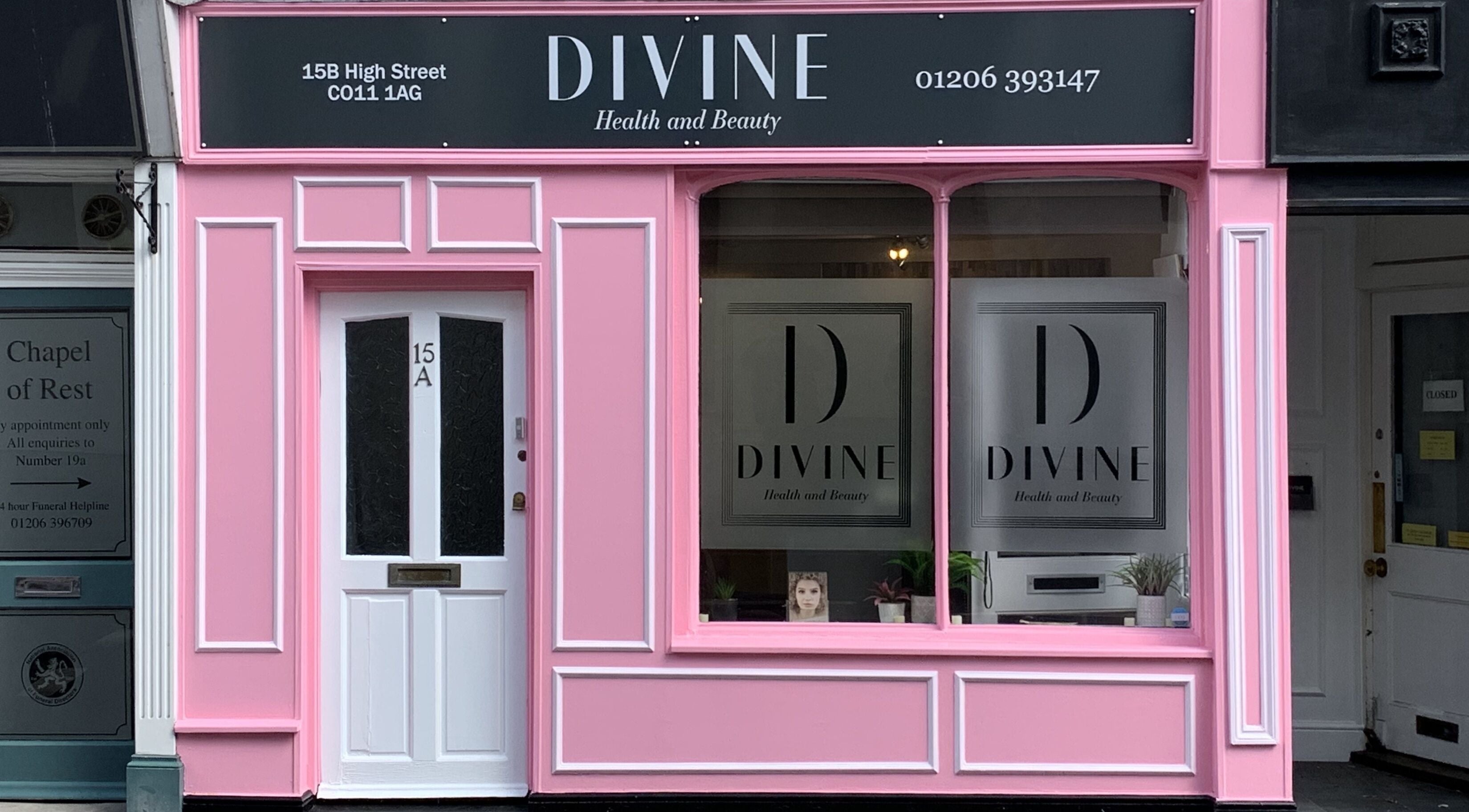 Bright pink facade of Divine Health and Beauty in Manningtree, England, GB.
