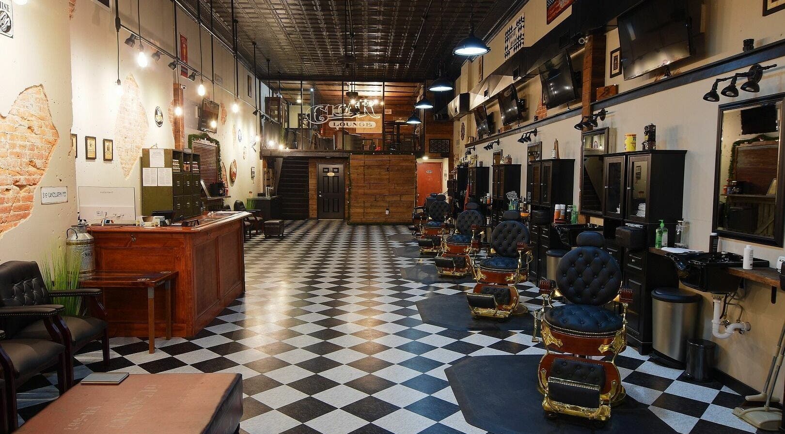 Chic interior of Two-Bit Barber Company in Sedalia, Missouri, US showcasing vintage barber chairs and classic decor.