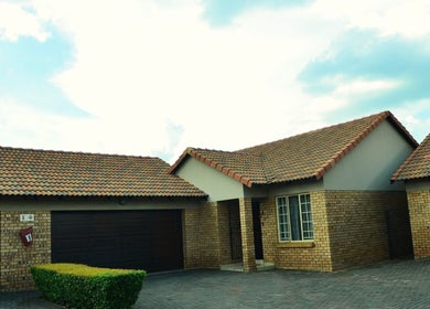 Front view of Babochka Hair and Makeup Artistry in Pretoria, Gauteng, ZA, showcasing its elegant brick facade.
