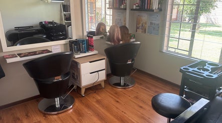 Sleek interior of Babochka Hair and Makeup Artistry in Pretoria, Gauteng, ZA, showcasing styling chairs and products.