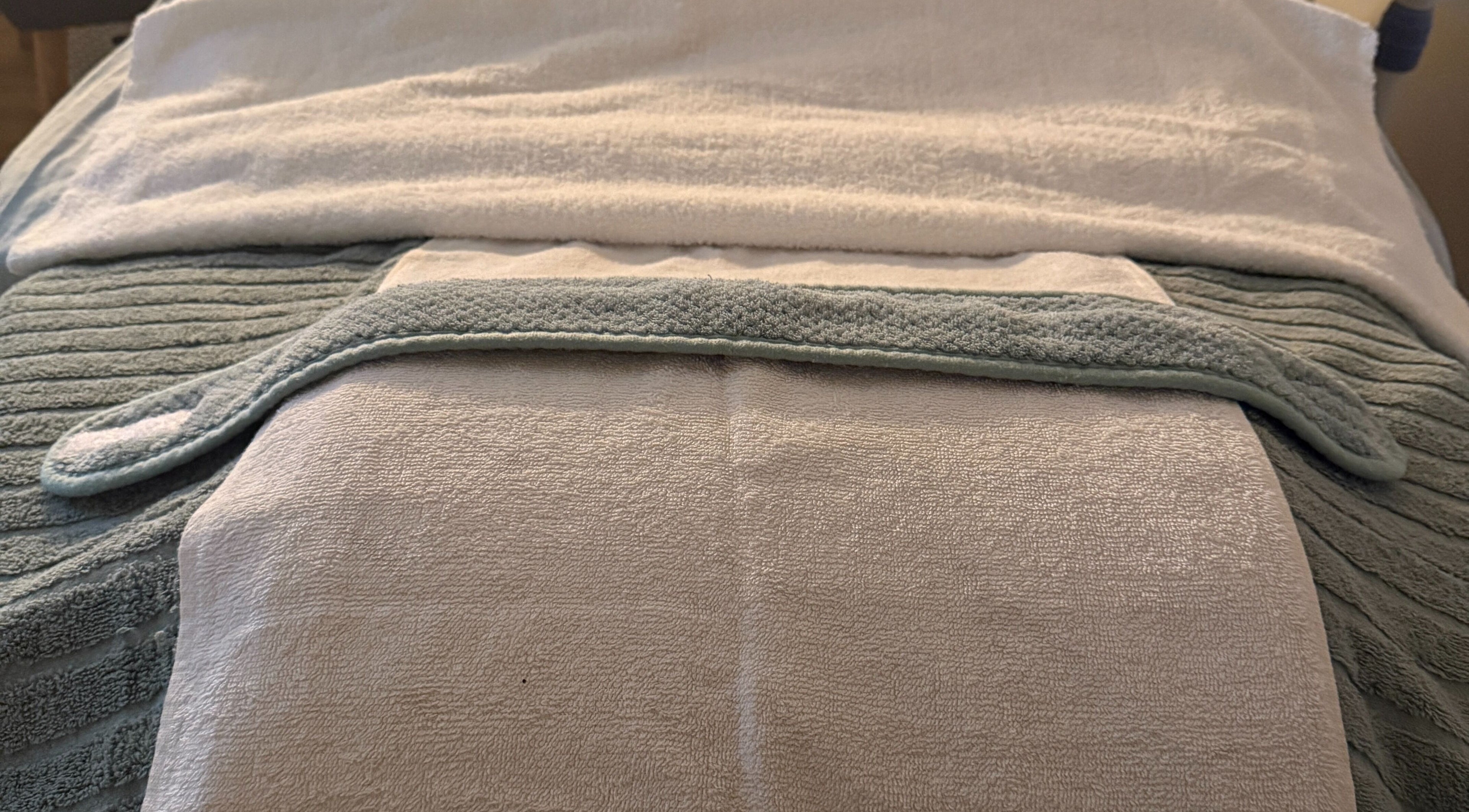 Relaxing therapy bed setup at Belle Beauty Collective, Melbourne, Victoria, AU, ready for rejuvenating spa services.