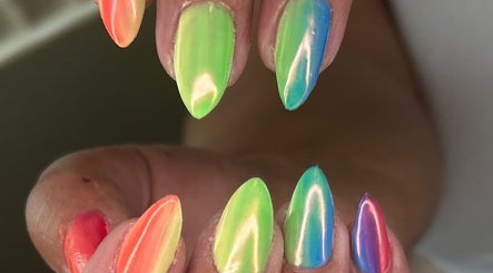 Colorful ombre nails at Truly Madly Nails & Beauty in Maltby, England, GB showcasing vibrant nail art.