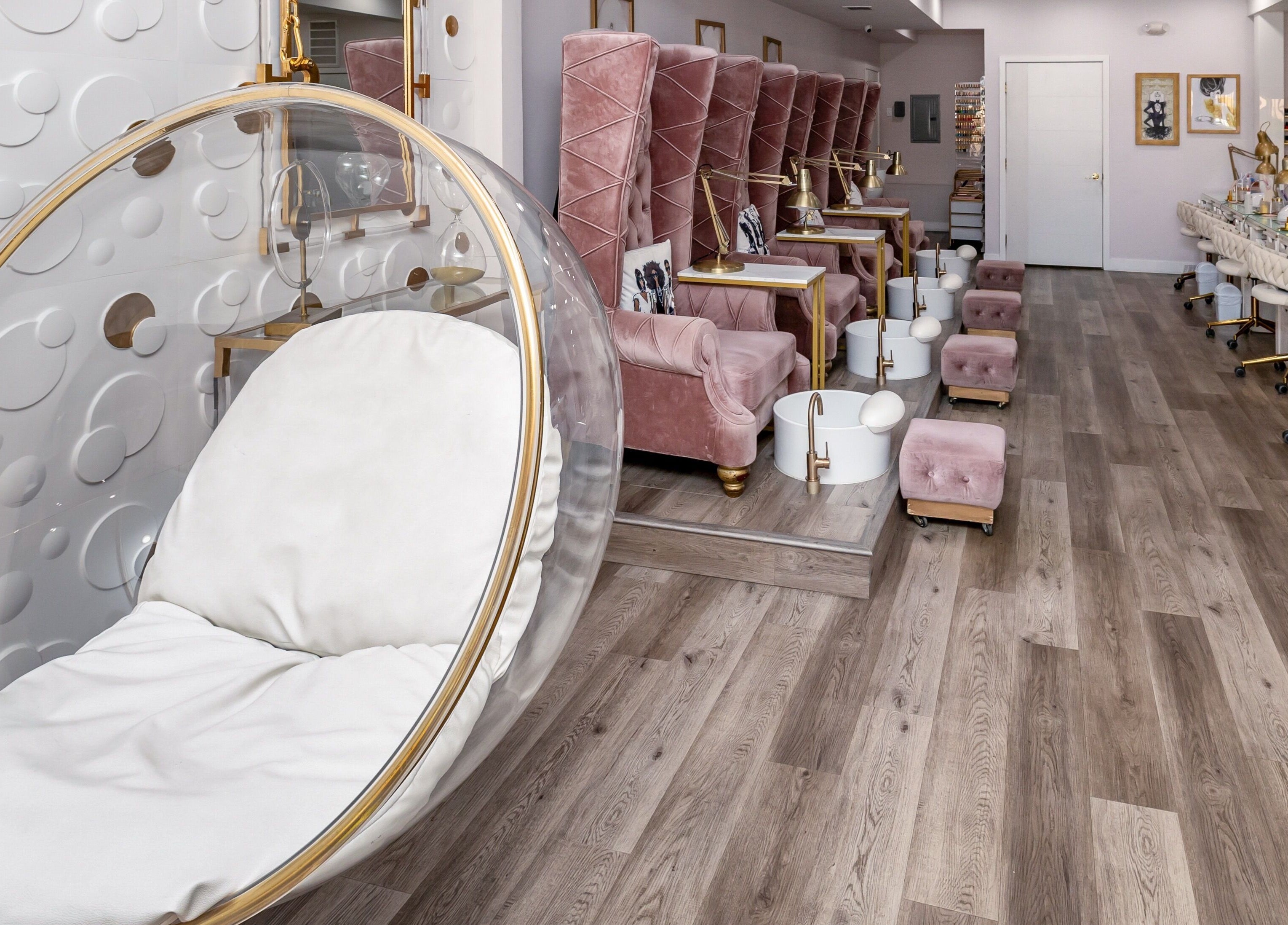 Elegant interior of Queen B Nail Salon in Glendale, California, US with plush seating and modern decor.