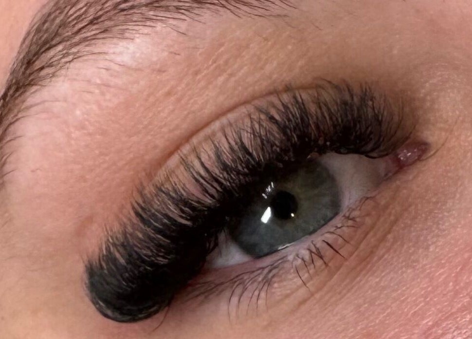 Close-up of eyelash extensions at Lashes and Lasering in Poringland, England, GB, showcasing detailed style.
