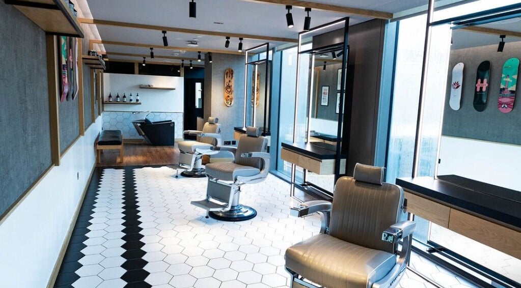 Modern interior of Akin Barber and Shop at 25 Hours Hotel, Dubai, Dubai, AE, showcasing stylish barber chairs.