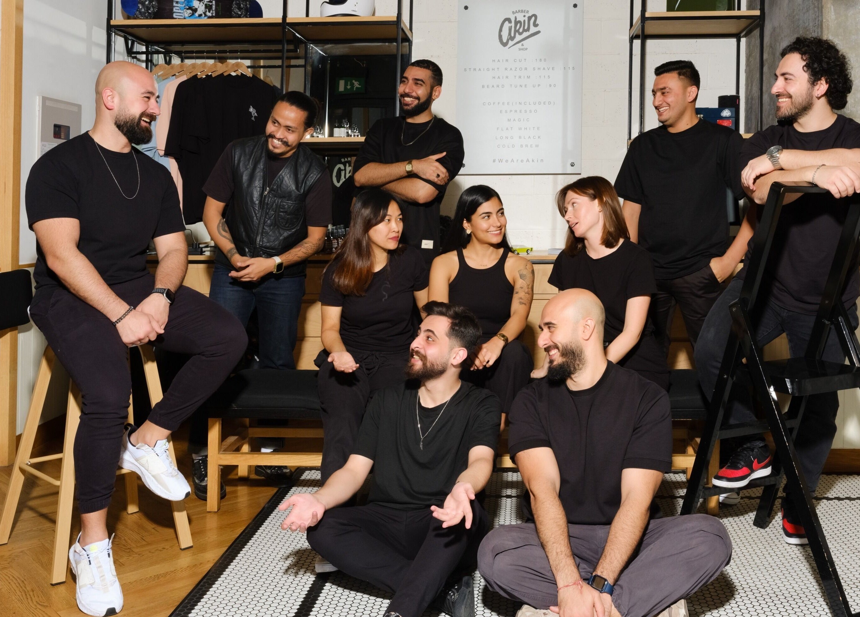 Friendly staff at Akin Barber and Shop, 25 Hours Hotel, Dubai, Dubai, AE, smiling and chatting together.