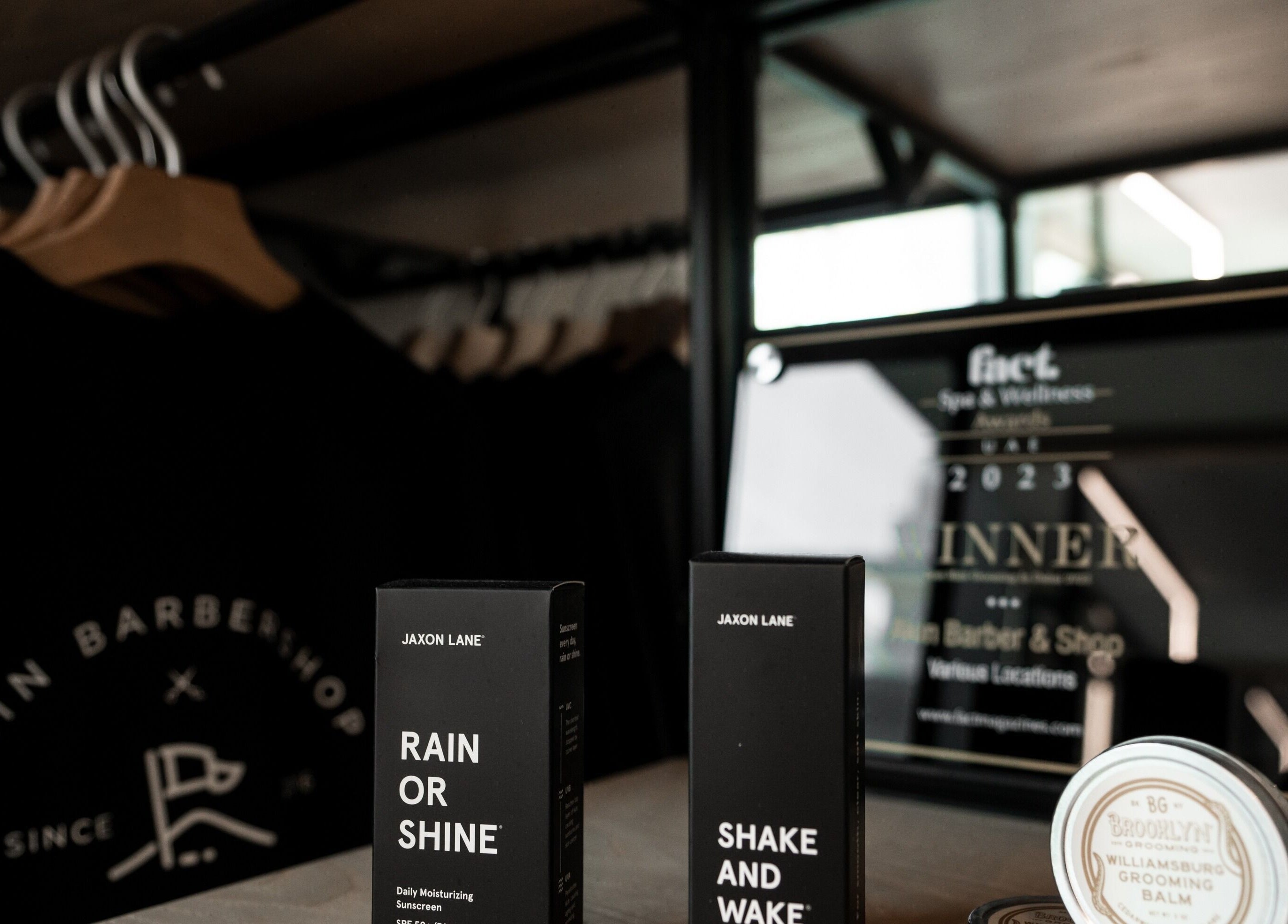 Grooming products at Akin Barber and Shop, 25 Hours Hotel, Dubai, Dubai, AE displayed elegantly on shelf.