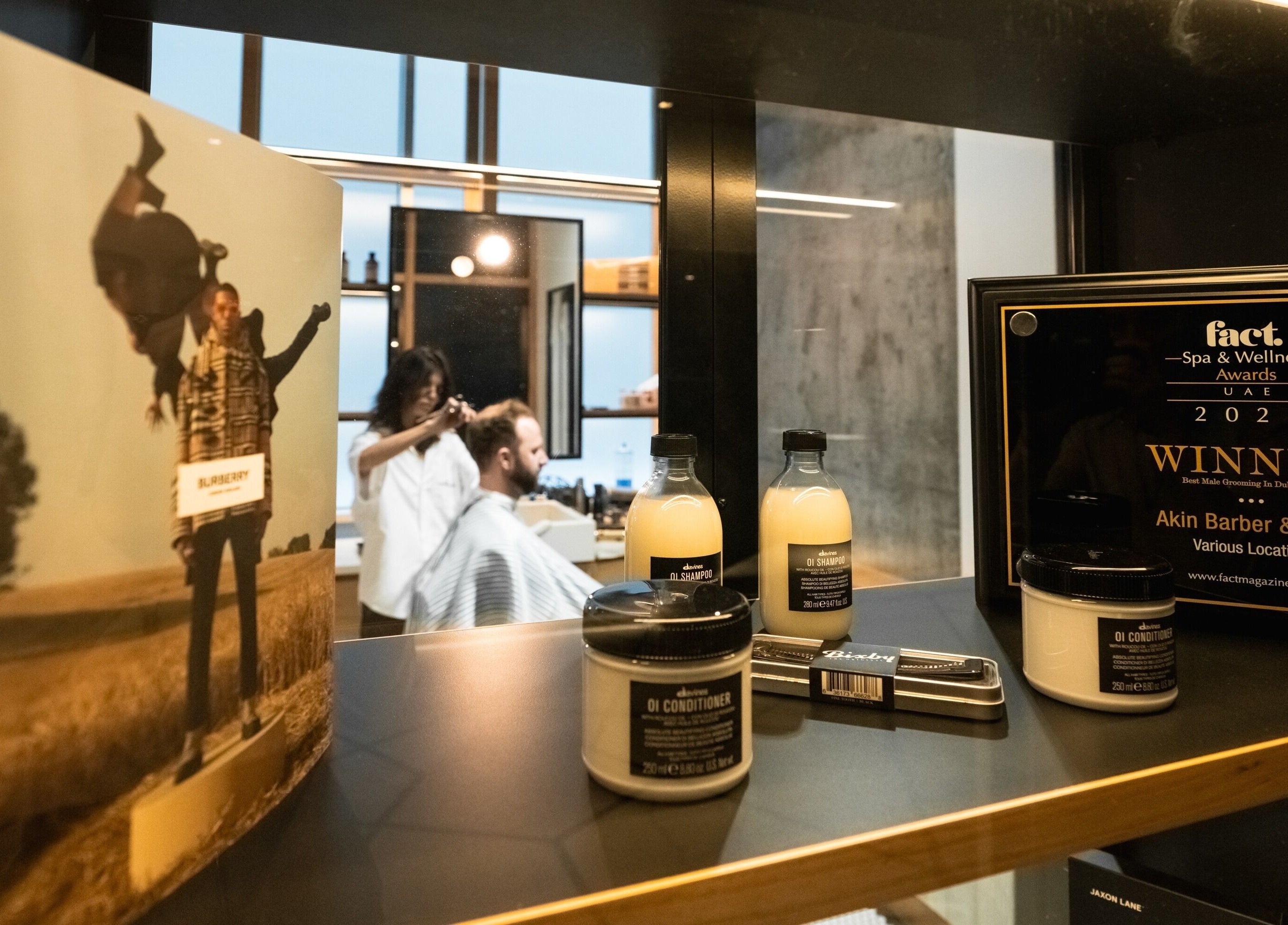 Akin Barber & Shop AbuDhabi By The Creek showcases awards and grooming products in Abu Dhabi, AE.
