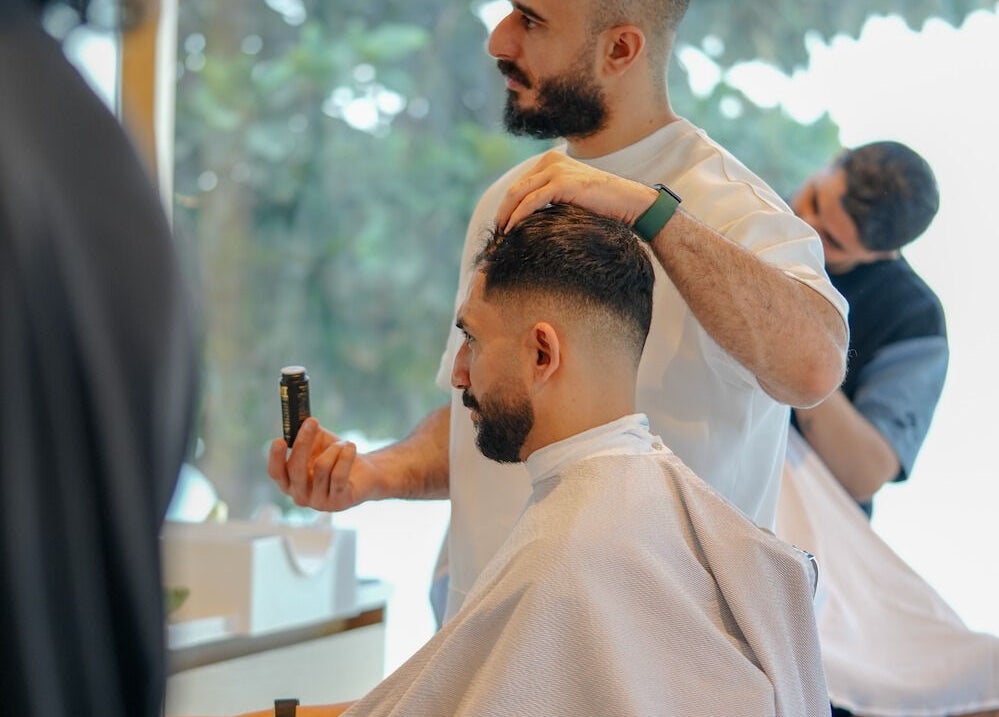 Haircut precision at Akin Barber & Shop AbuDhabi By The Creek, Abu Dhabi, Abu Dhabi, AE.