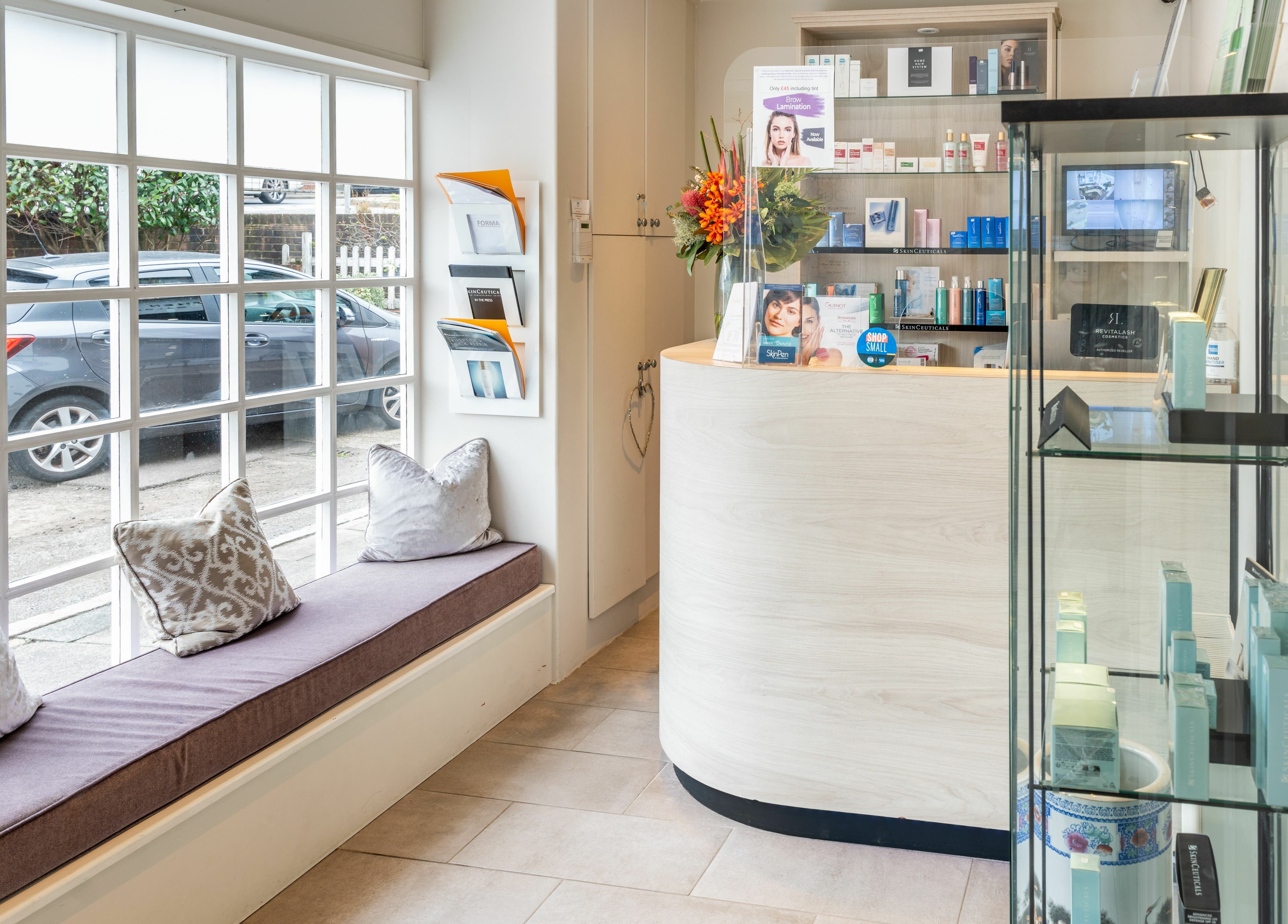 Hawkins Clinic reception area with products, London, England, GB welcoming atmosphere.