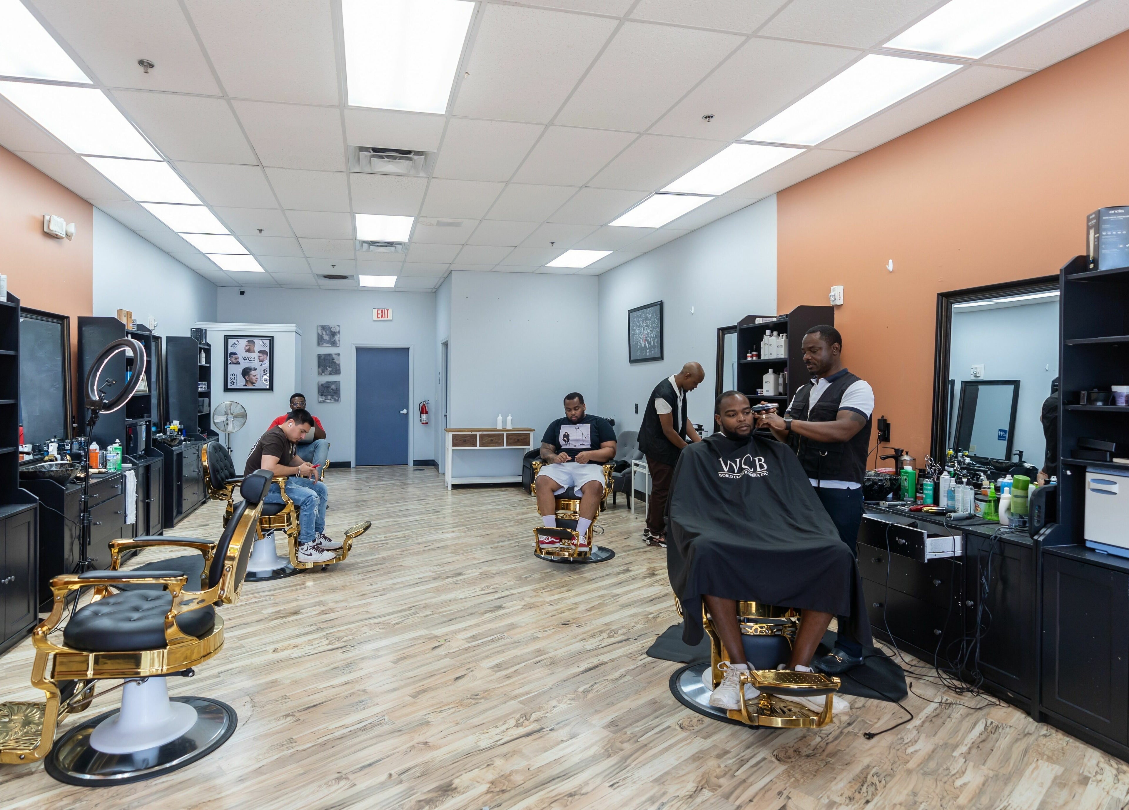 Modern barber chairs and stylists at World Class Barbers - Matthews, Matthews, North Carolina, US.