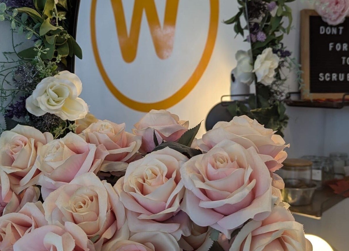 Elegant rose bouquet at The Wax Room, Paignton, England, GB, enhancing a serene atmosphere with floral decor.