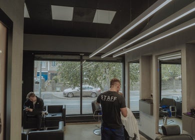 Interior of Old County Clondalkin salon in Dublin, County Dublin, IE, showcasing modern styling stations and decor.