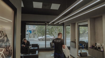 Interior of Old County Clondalkin salon in Dublin, County Dublin, IE, showcasing modern styling stations and decor.