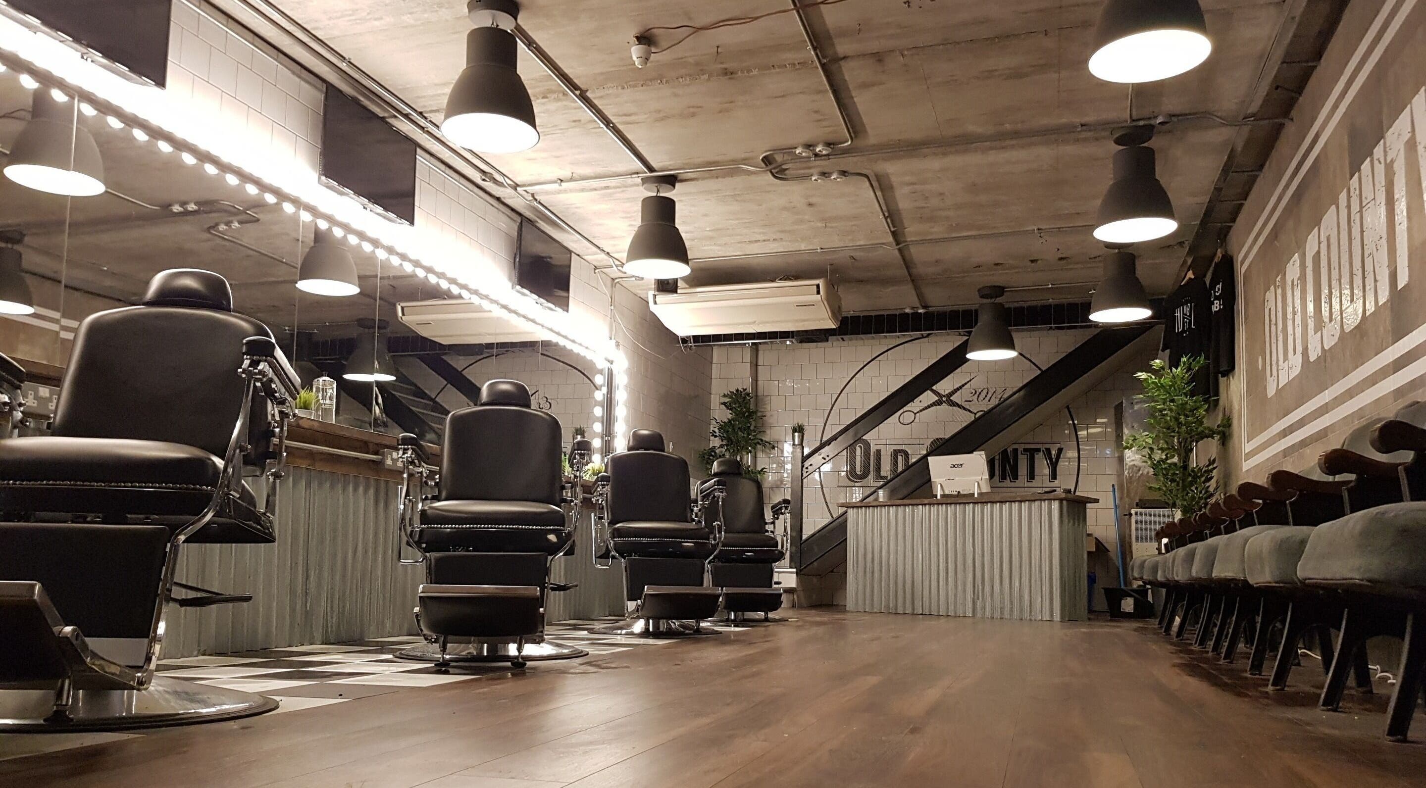 Modern barber chairs inside Old County Newbridge, Newbridge, County Kildare, IE, cozy and stylish interior.