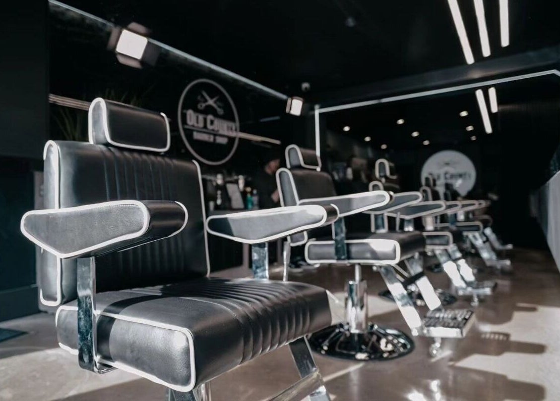 Modern barber chairs at Old County Newbridge, Newbridge, County Kildare, IE, showcasing comfort and style.