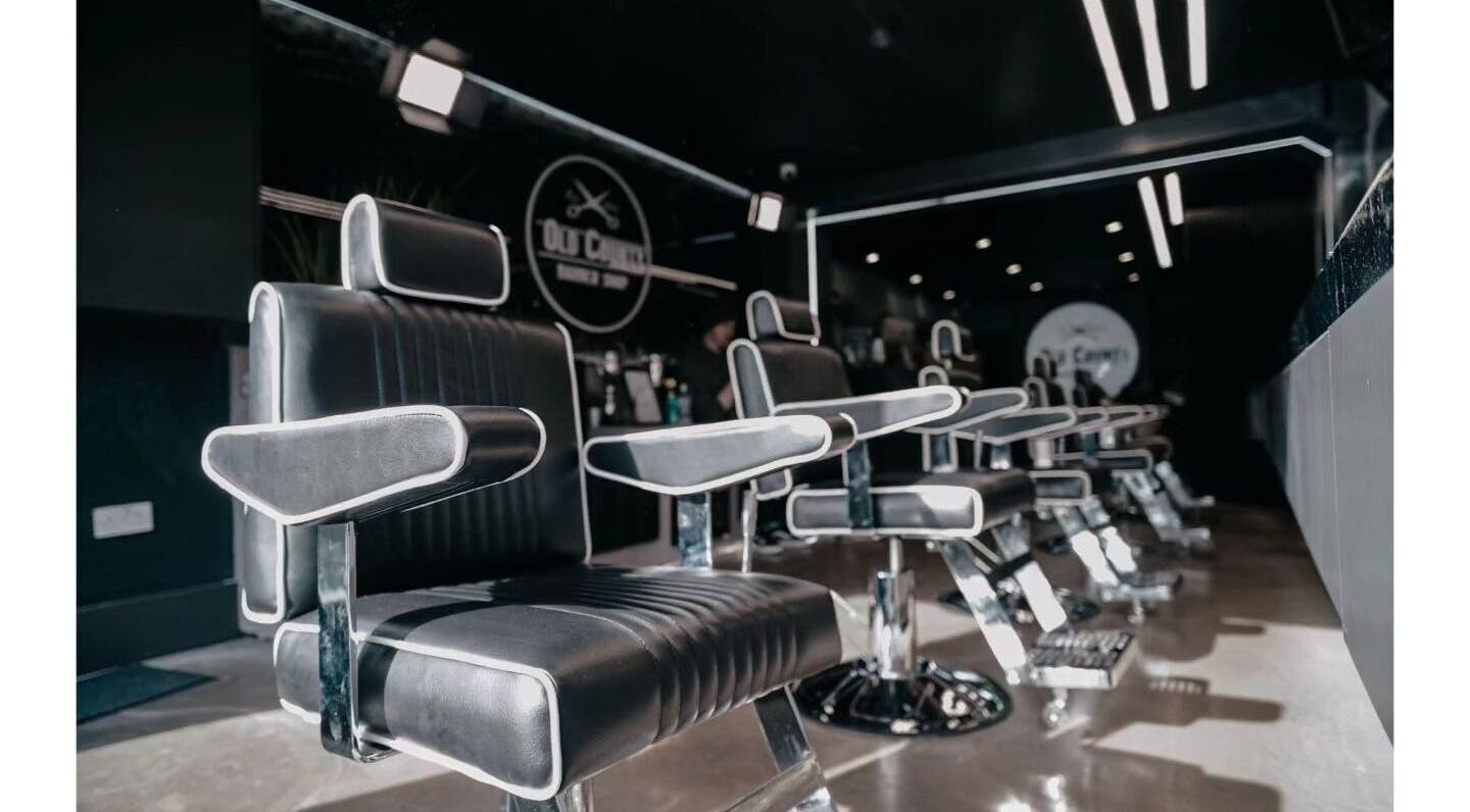 Modern barber chairs at Old County Newbridge, Newbridge, County Kildare, IE, showcasing comfort and style.