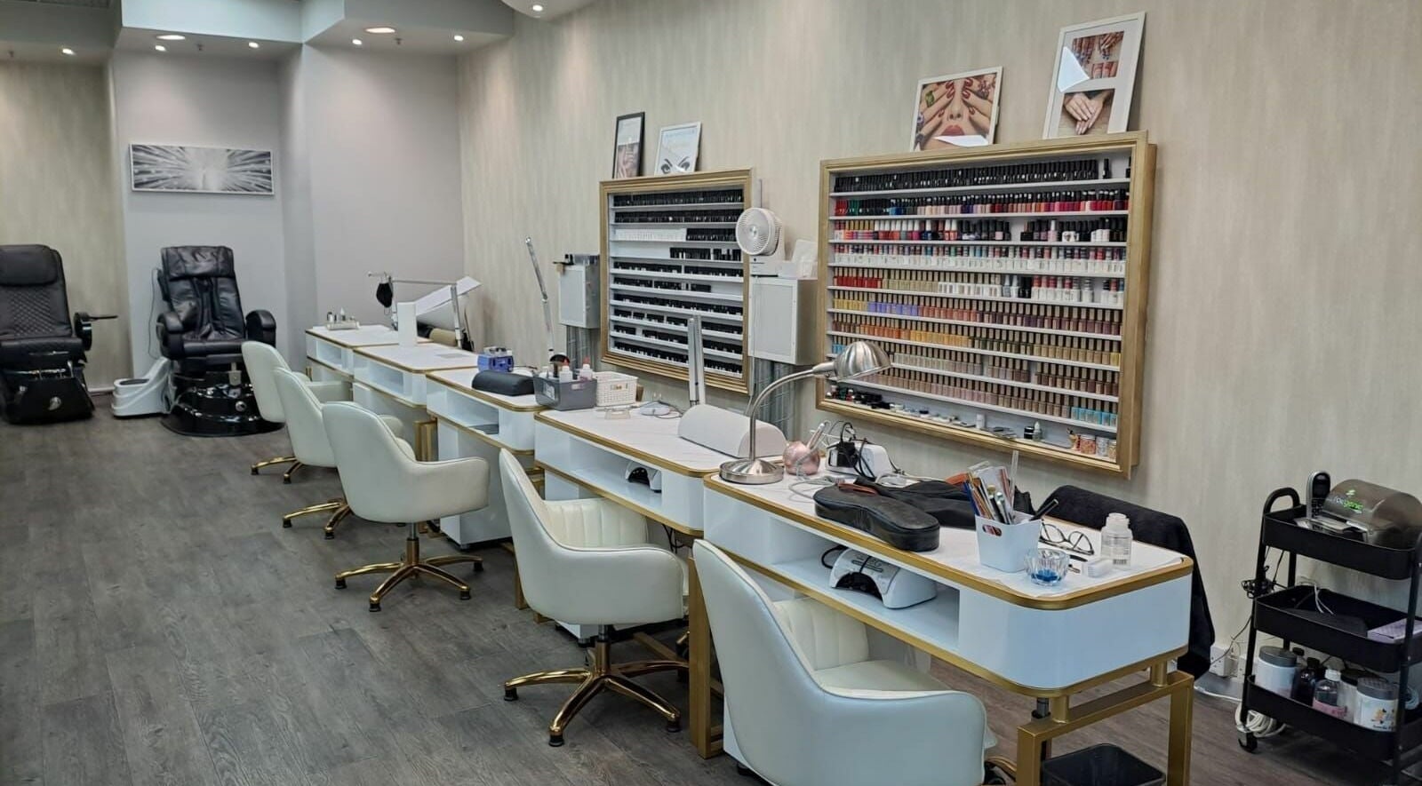 Elegant nail salon at Cover Beauty - Metrocentre, Metrocentre, England, GB with luxurious seating and polish selection.