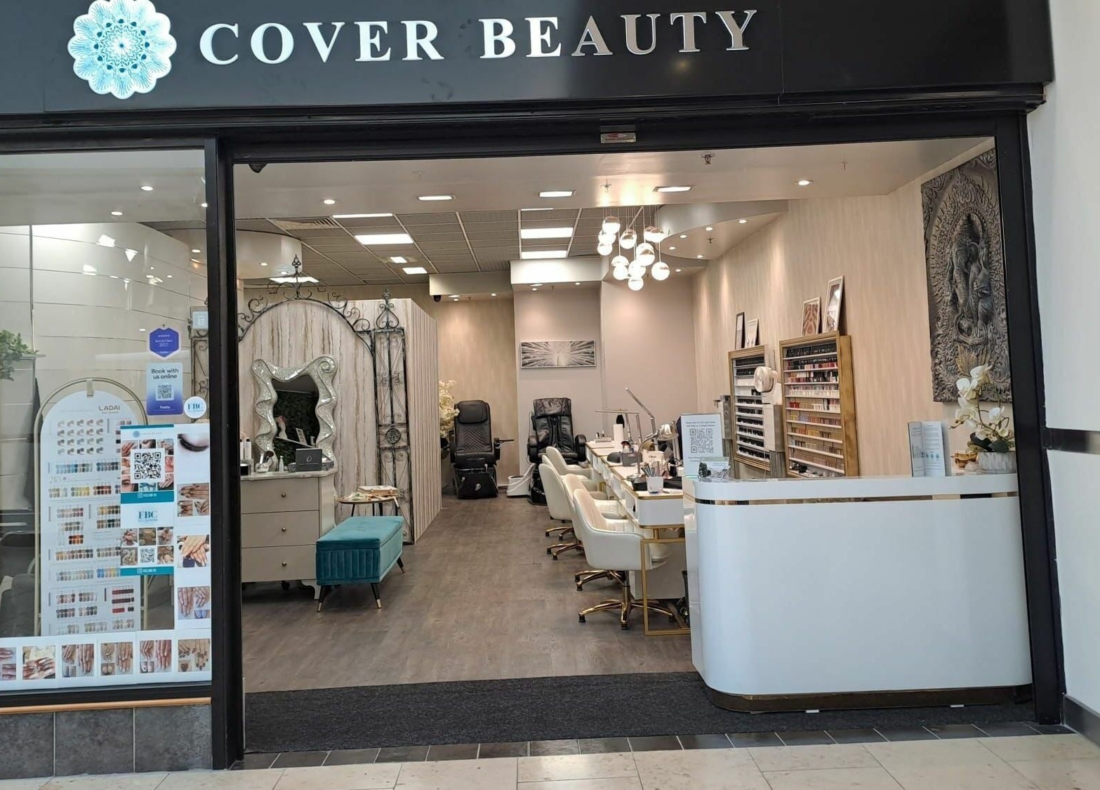 Interior view of Cover Beauty - Metrocentre in England, GB, showcasing elegant salon setup and decor.