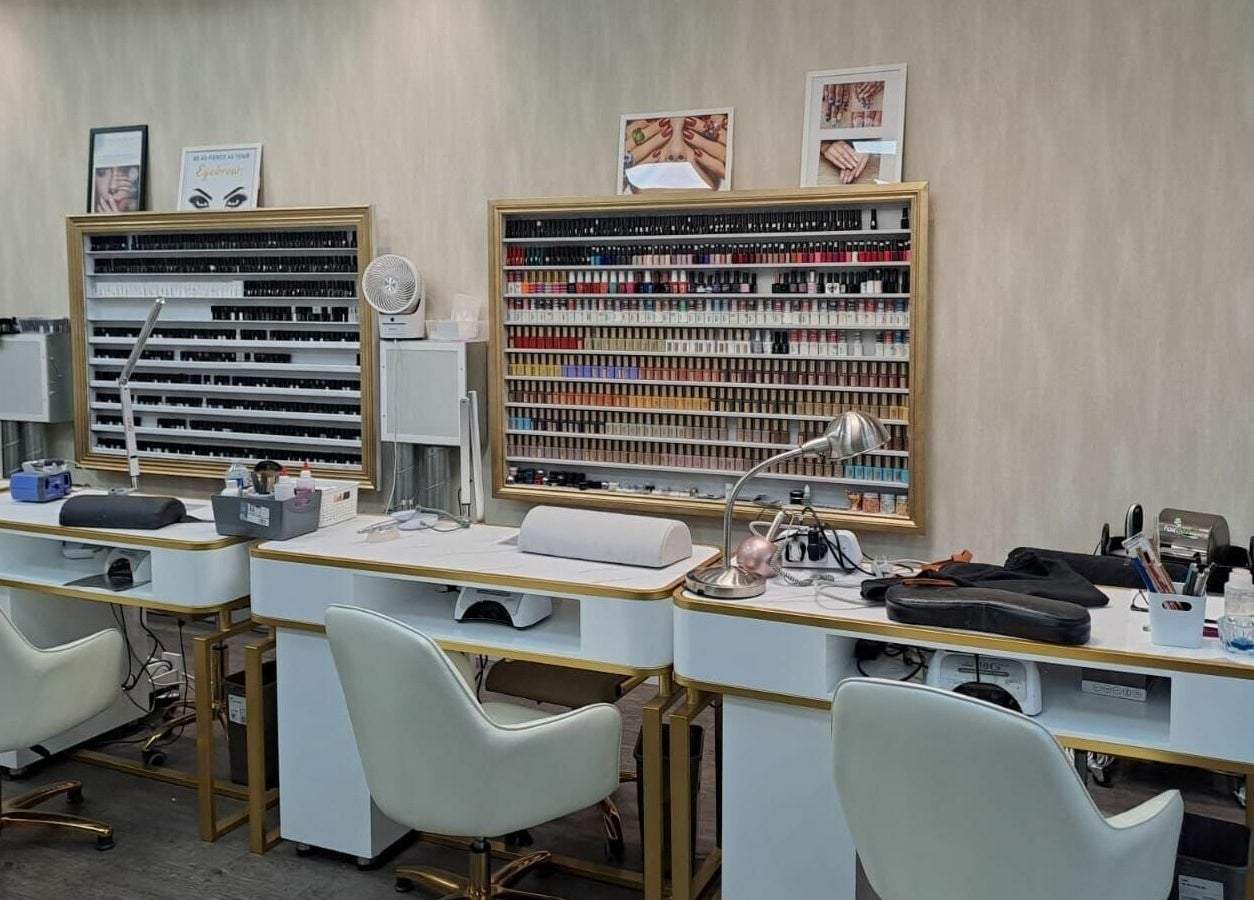 Elegant nail bar at Cover Beauty - Metrocentre, showcasing nail polish collection in Metrocentre, England, GB.