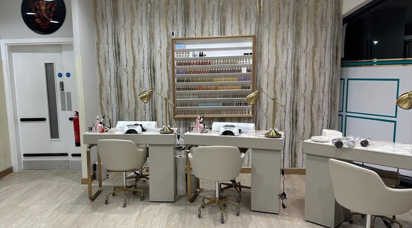 Elegant nail salon interior at Cover Beauty- Dalton Park, Murton, England, GB with stylish manicure stations.